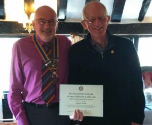 Andrew receives certificate from President Paul Hooke-Overy (on left)
